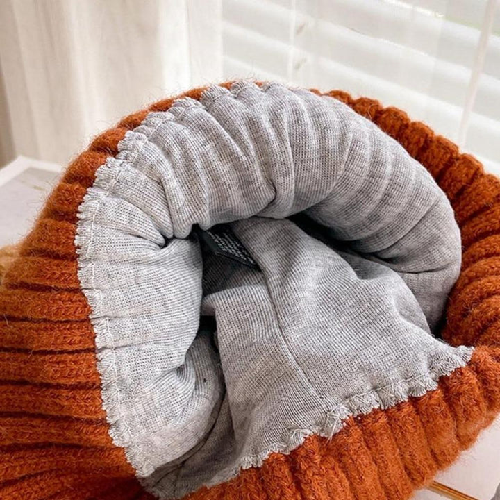 Adorable women's knitted cat ear winter hat. Soft, warm, and cozy beanie, a fun accessory for cold weather.