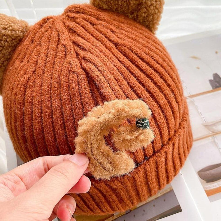 Soft knitted women's cat ear winter hat. Keep warm with this cute, cozy beanie, a fun fashion statement.