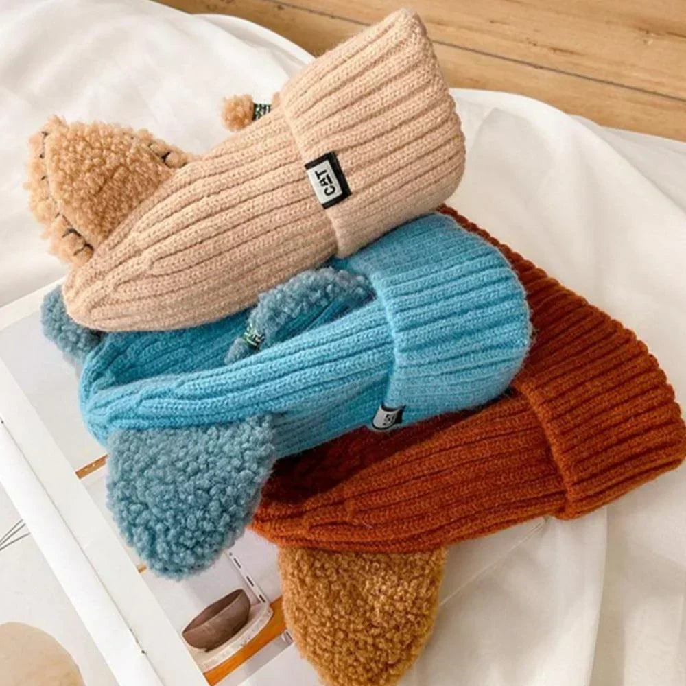 Cozy women's cat ear knitted hat. A warm, playful winter beanie for a cute and stylish cold-weather outfit.