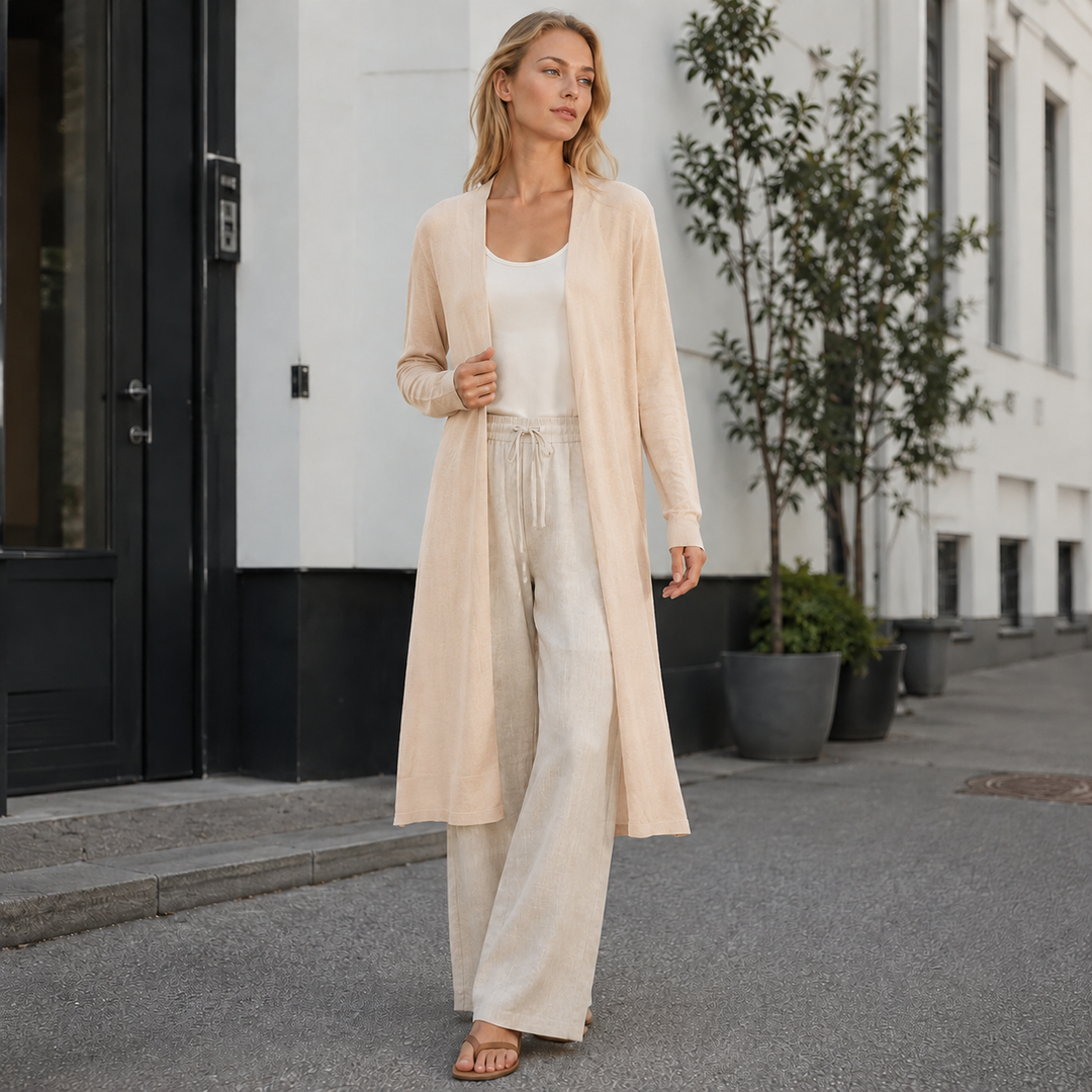 Cozy women's knit cardigan, a long stylish layer for versatile everyday wear.