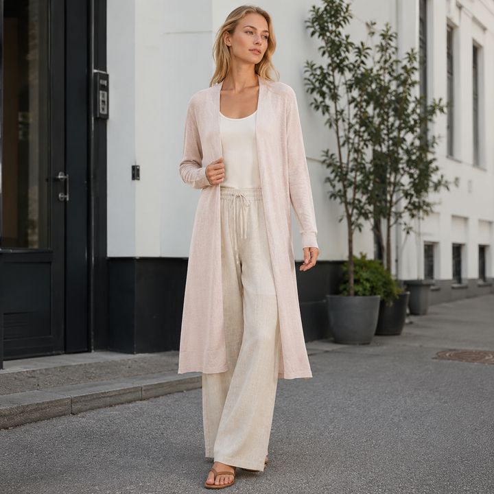 Everyday women's open front knit cardigan, providing long, cozy warmth & style.