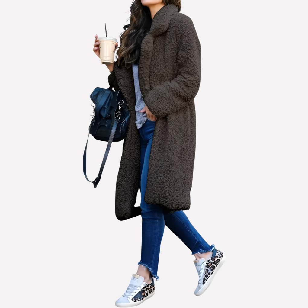 Elegant black longline teddy coat for women, with a stylish notched collar and soft texture, great for cold days.