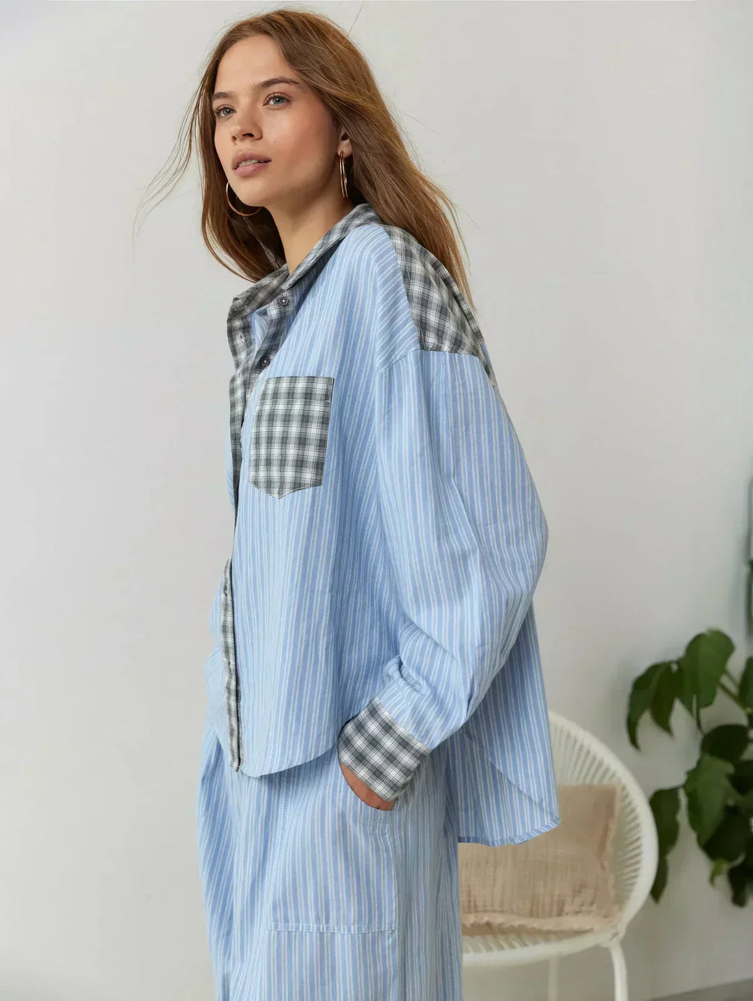 Super cozy women's plaid button-up pajama set. Ideal two-piece loungewear for ultimate comfort.