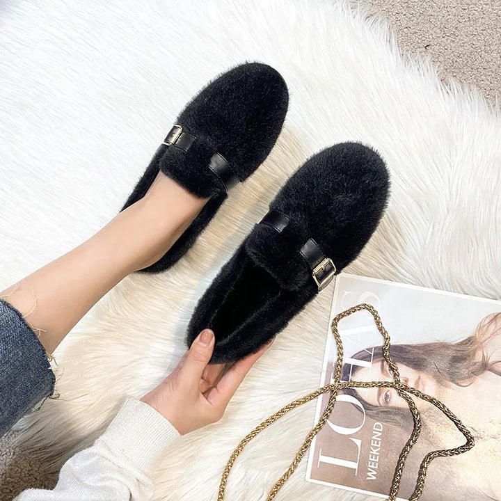 Close-up of soft plush women's flats, emphasizing texture & ultimate comfort. Cozy slip-on loafers for winter.