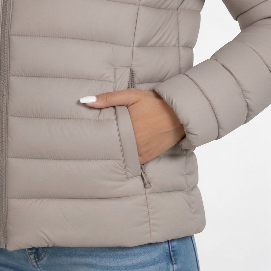 Cozy women's quilted outerwear jacket, ideal for casual winter wear with its stand collar & zip.