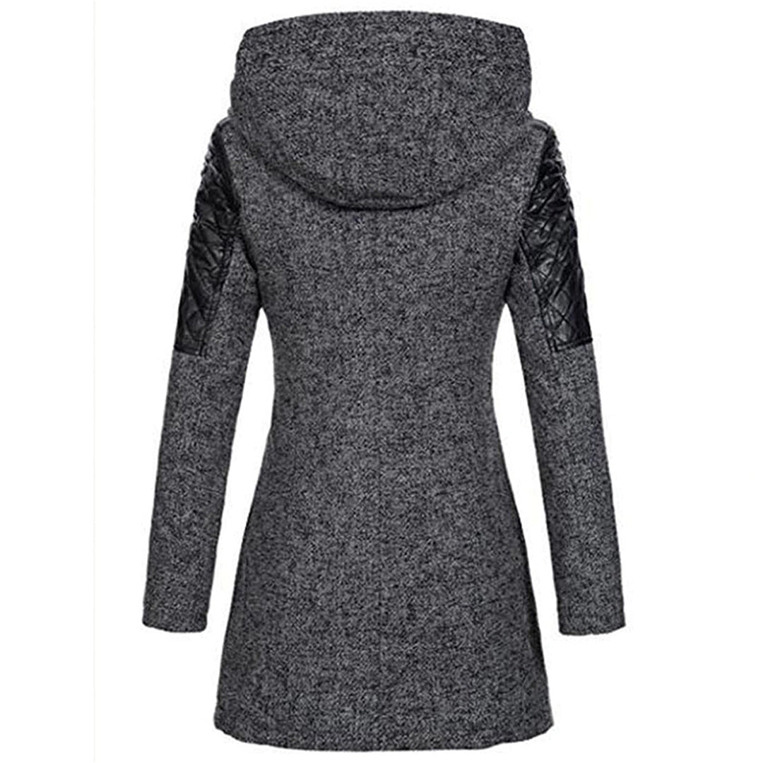 Elegant women's quilted winter coat, full length. Long sleeve design provides cozy outerwear for fall.