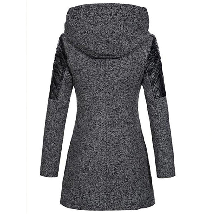 Elegant women's quilted winter coat, full length. Long sleeve design provides cozy outerwear for fall.