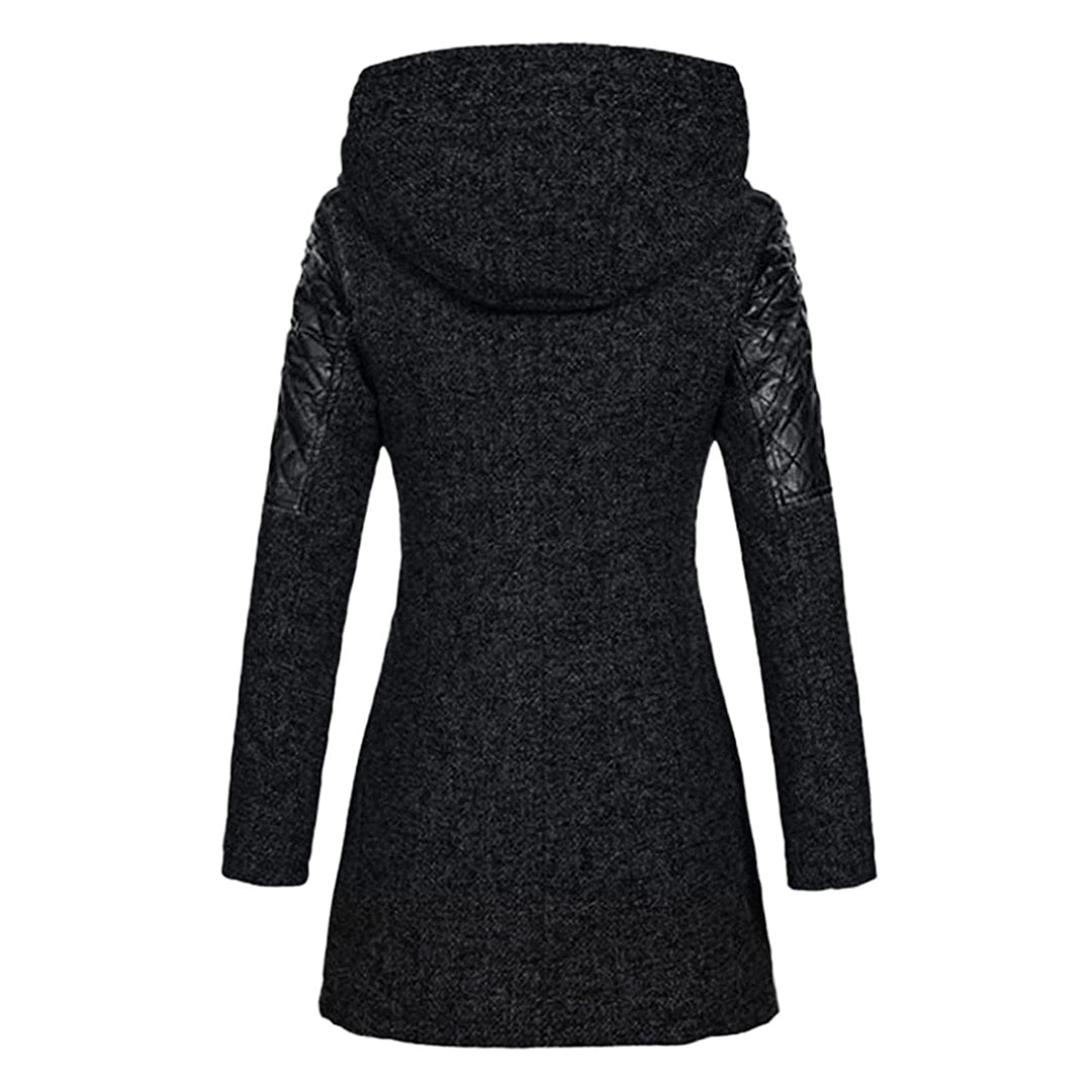 Warm women's winter jacket with intricate quilting details. Perfect for cold weather & everyday elegance.