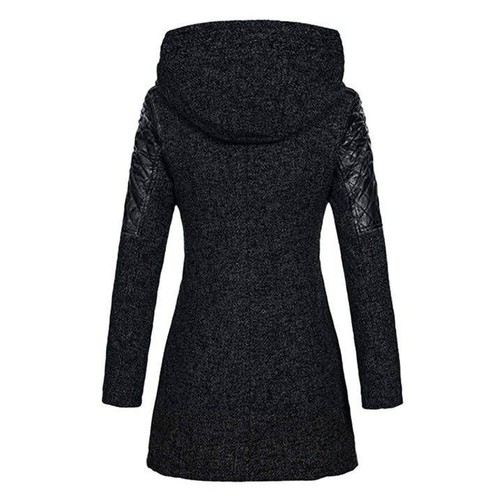 Warm women's winter jacket with intricate quilting details. Perfect for cold weather & everyday elegance.