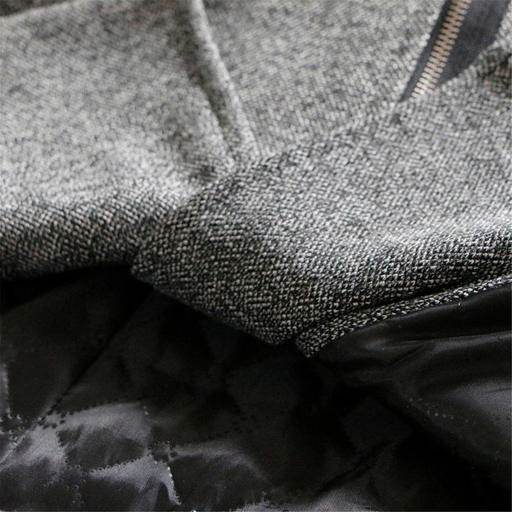 Back view of a women's warm winter coat with subtle quilting. Perfect for cozy cold weather style.