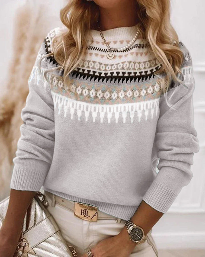 Relaxed fit women's long sleeve sweater, a versatile layering piece for fall and winter fashion.
