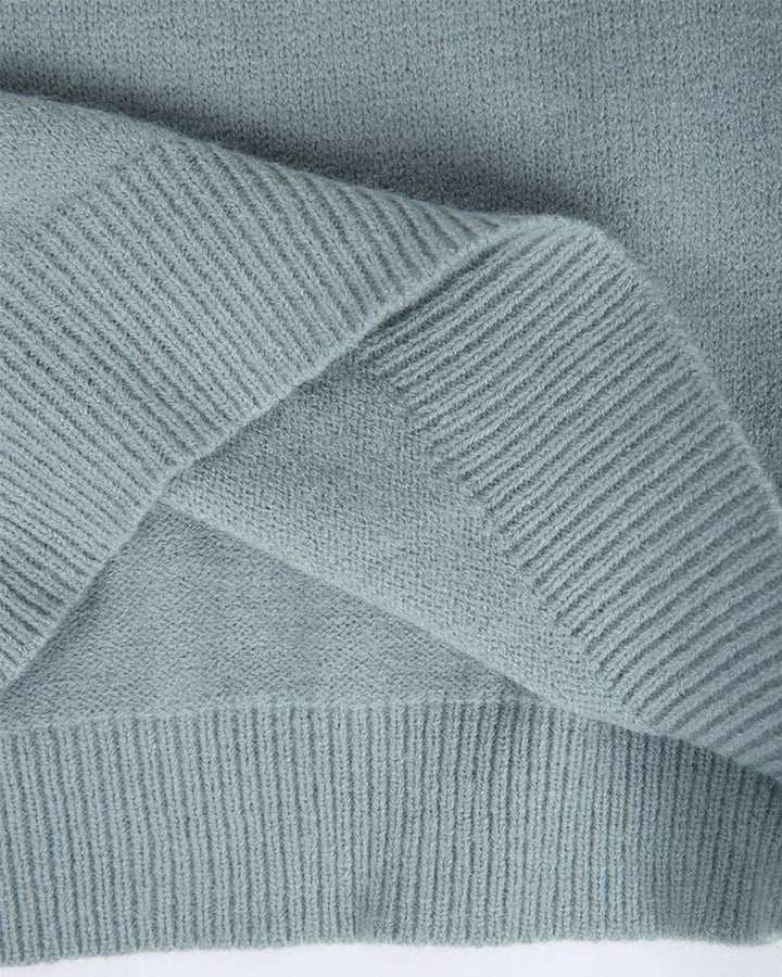 Feminine, cozy relaxed fit sweater for women. A comfortable long sleeve top for versatile everyday wear.