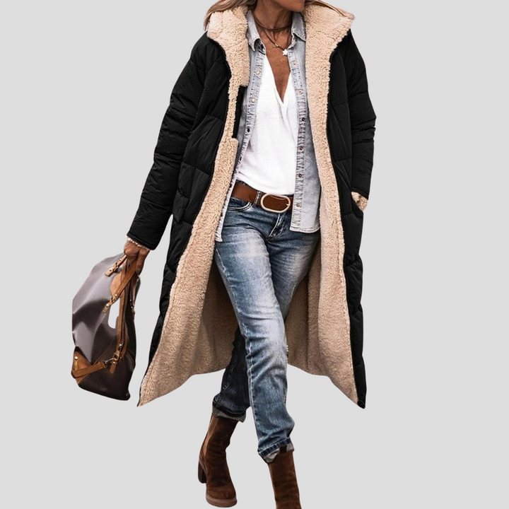 Women's cozy reversible hooded winter coat, perfect for cold weather style and comfort.