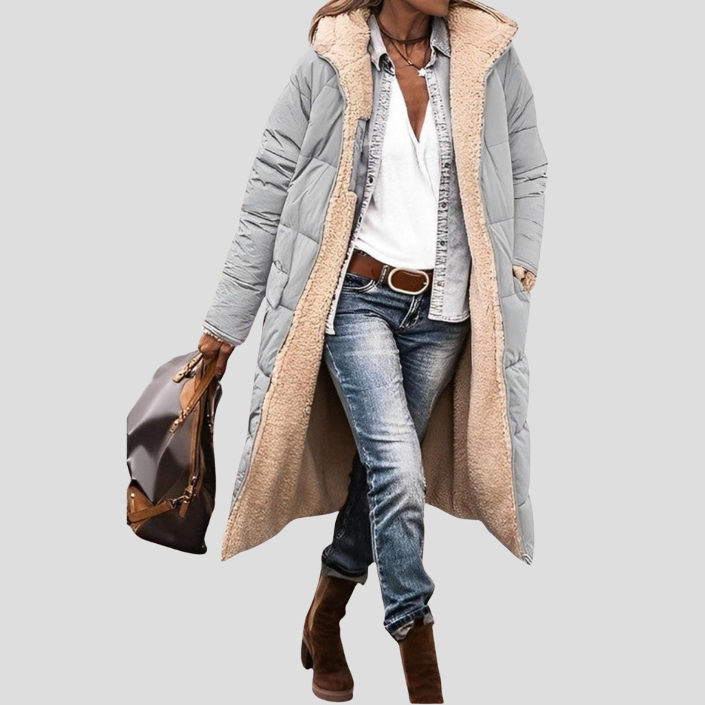 Everyday women's cozy winter coat. Reversible hooded jacket offers warmth & comfort in cold weather.