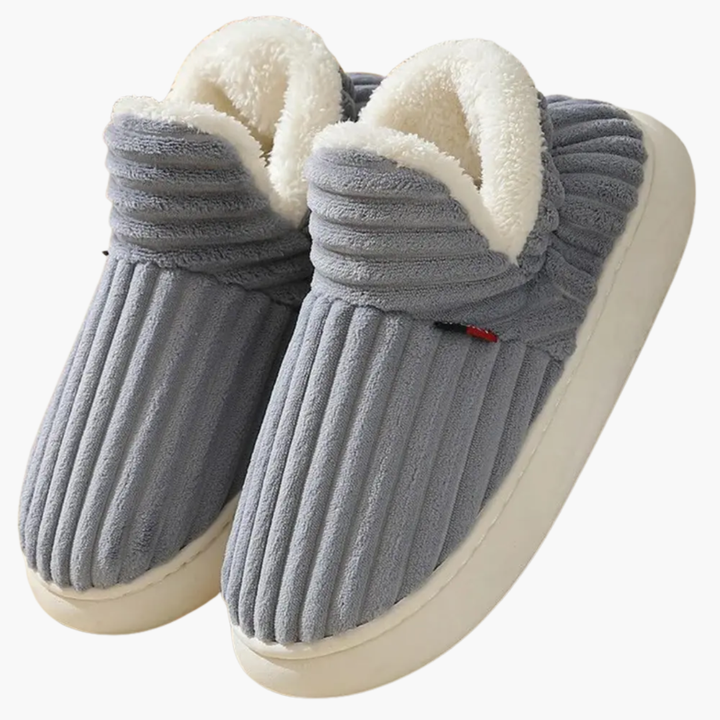 Plush women's ribbed bootie slippers providing ultimate warmth & cozy comfort. Perfect indoor footwear.