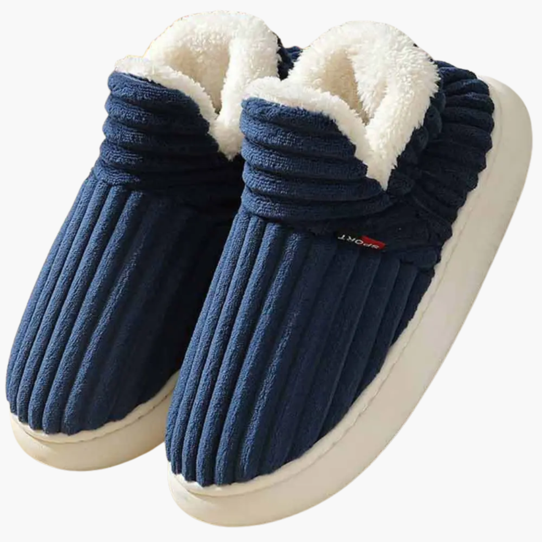Stylish ribbed women's bootie slippers, ideal for cozy home wear. Warm plush indoor slip-on shoes for relaxation.
