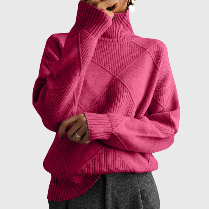 Women's cozy roll neck sweater in a relaxed fit, perfect for winter warmth and comfort.