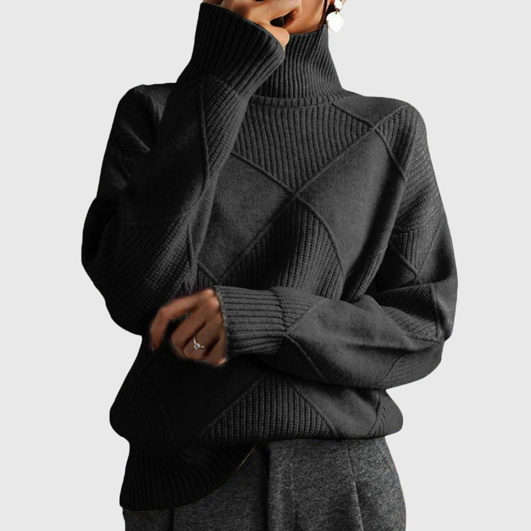 Cozy women's knit sweater with a warm roll neck and relaxed, oversized fit for winter.