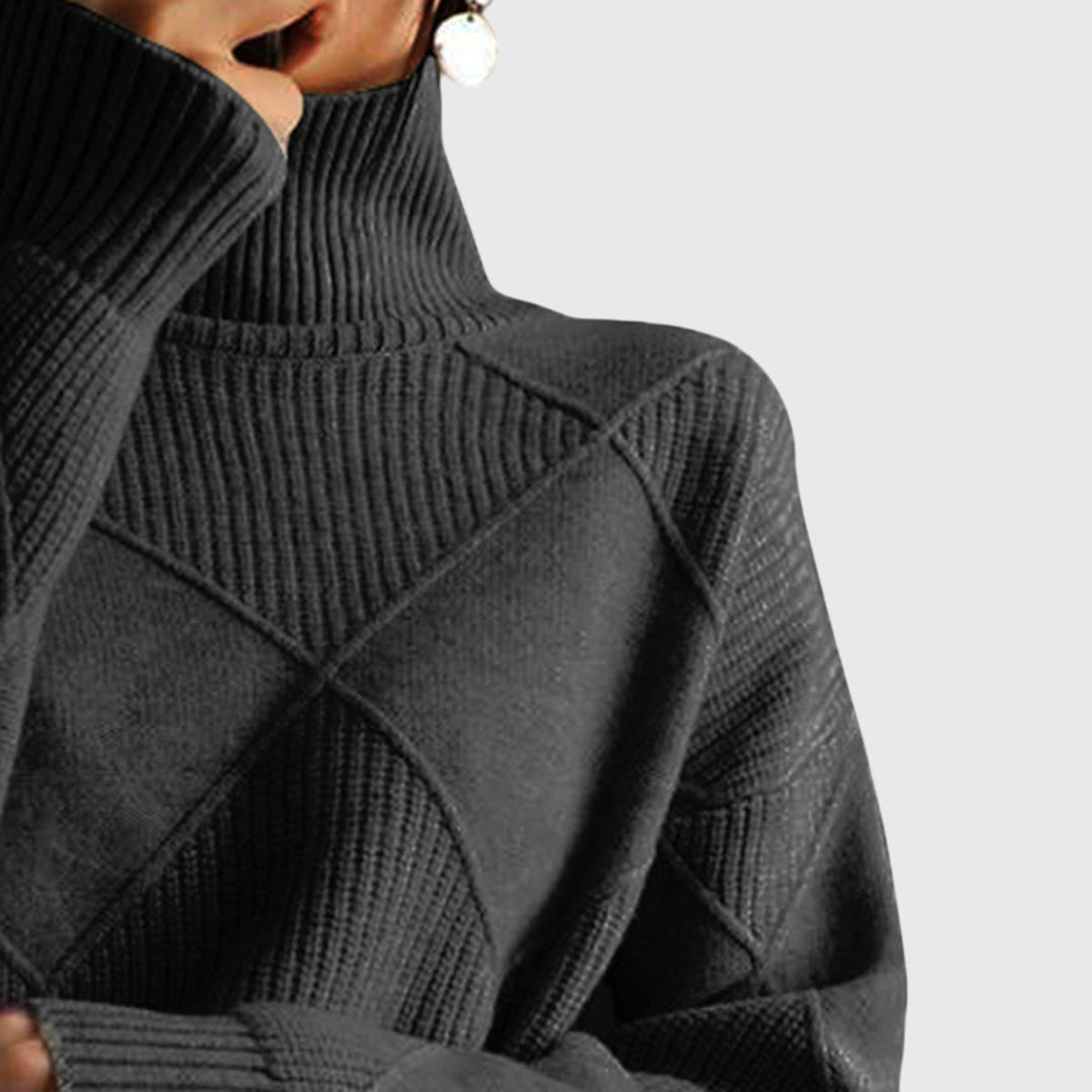 Women's warm, versatile roll neck jumper with a comfy oversized fit and drop shoulder.