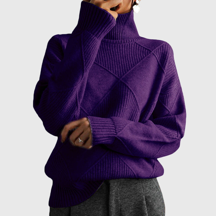 Drop shoulder roll neck sweater for women, offering cozy winter warmth and stylish design.