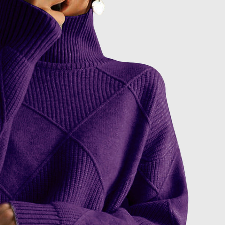 Women's cozy winter roll neck sweater, featuring a stylish diagonal seam and long sleeves.