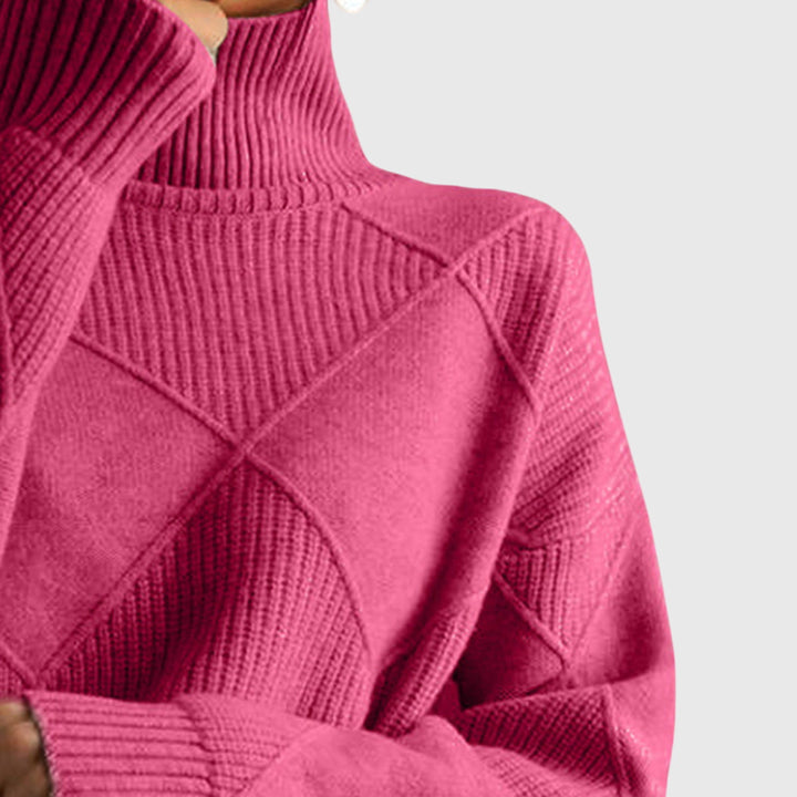 Oversized women's drop shoulder roll neck sweater, a warm, versatile winter top.