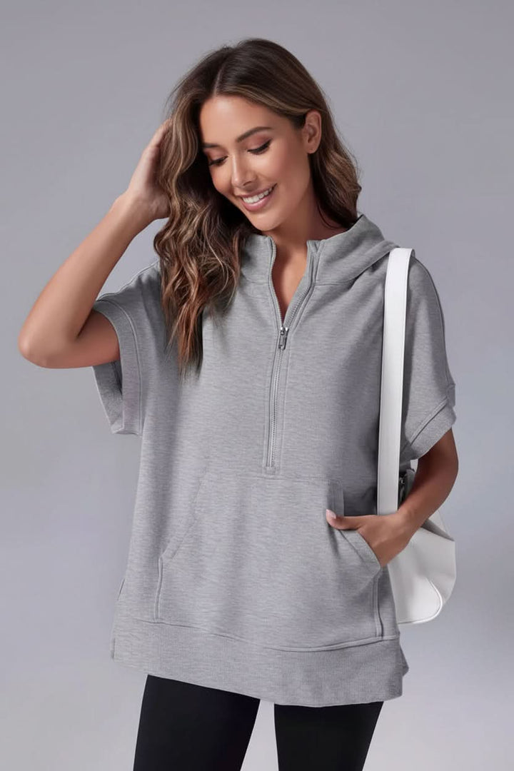 Stylish women's short sleeve half-zip hoodie for effortless casual and streetwear fashion.