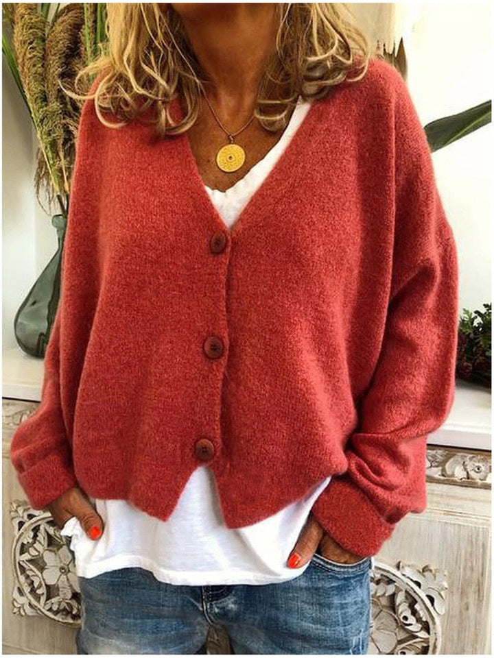 Long sleeve women's cozy knit cardigan, a versatile layering piece for winter warmth & style.