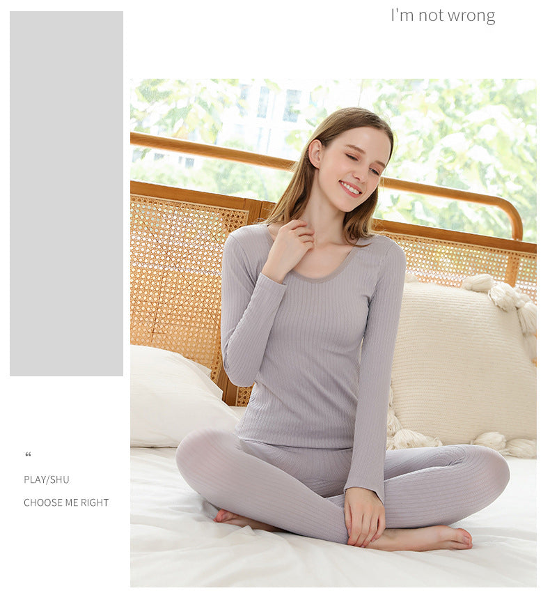 Lightweight women's thermal base layer set for effective cold weather layering.