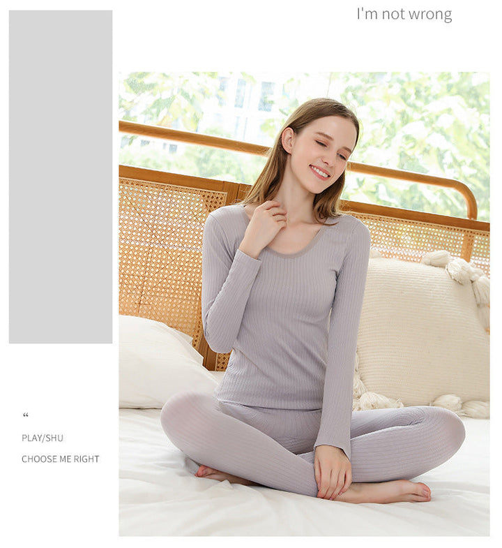 Lightweight women's thermal base layer set for effective cold weather layering.