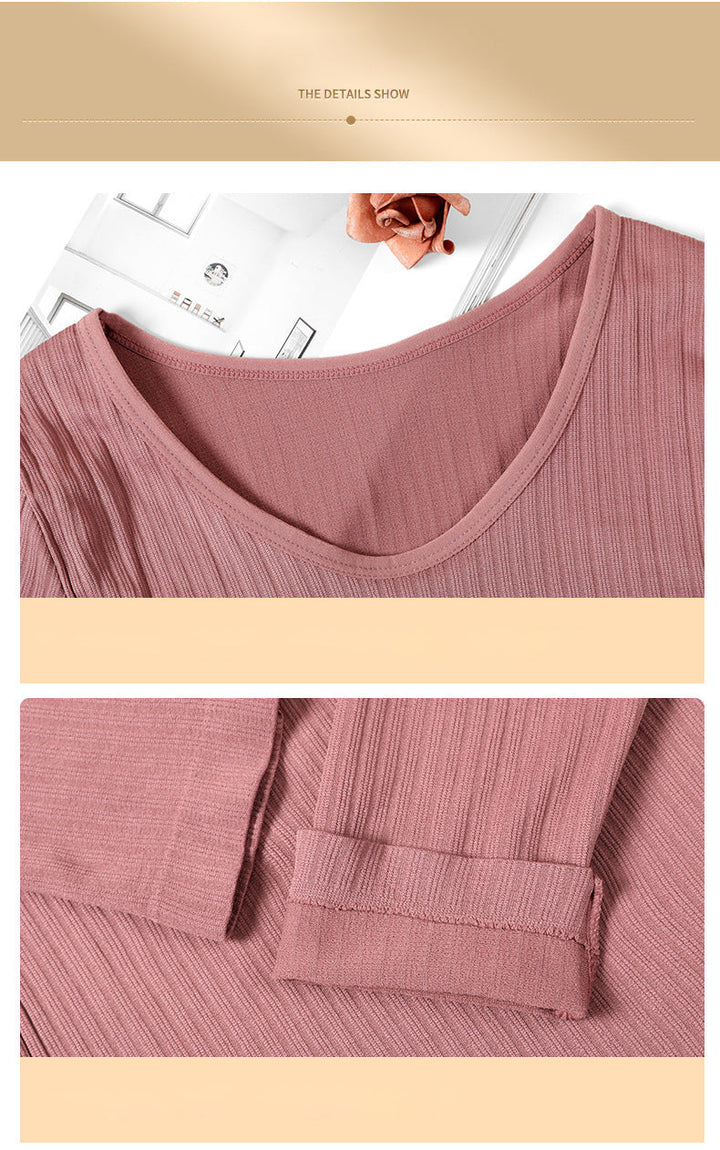 Women's warm long sleeve base layer top, ideal for layering under winter wear.