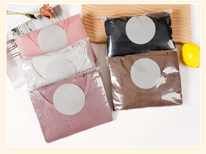 Women's thermal loungewear set in a neutral color, perfect for cozy evenings.