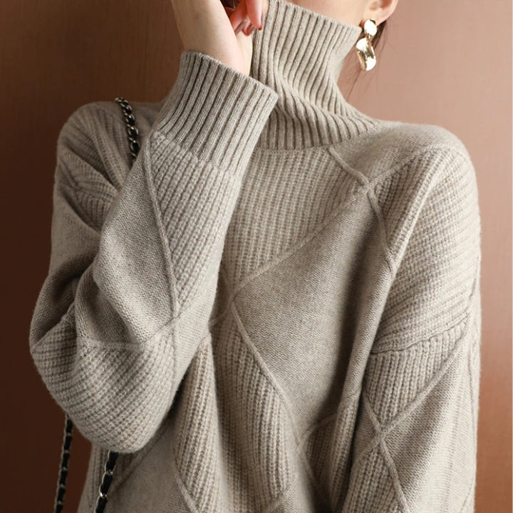 Stylish women's turtleneck knit pullover, essential cozy knitwear for elegant autumn fashion.