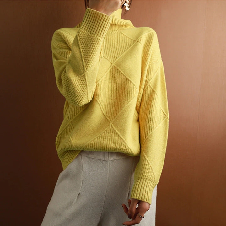 Women's cozy turtleneck knit sweater, perfect autumn style long sleeve top for comfortable wear.