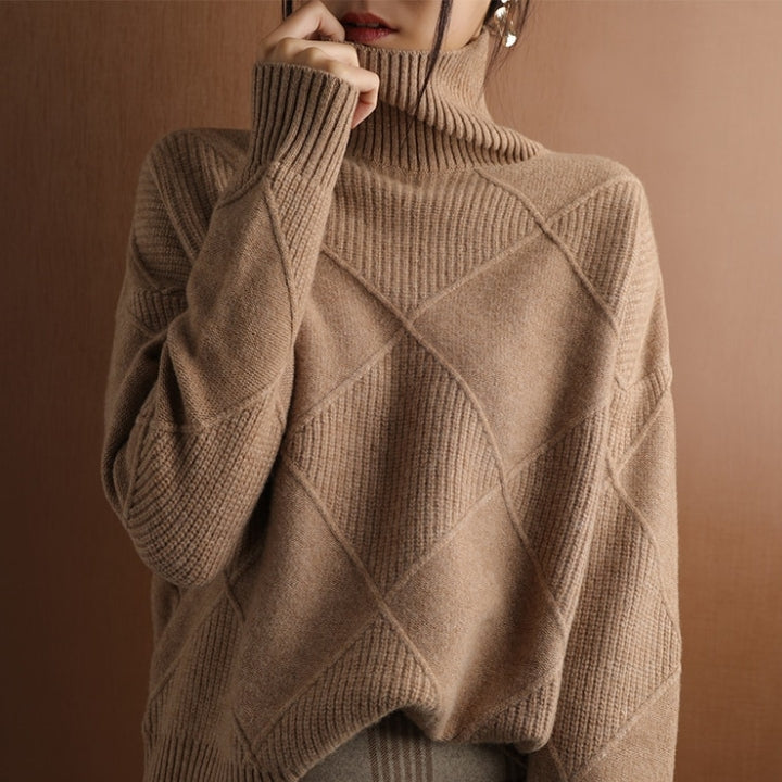 Sophisticated women's turtleneck knit sweater, an elegant pullover for chic autumn and winter fashion.