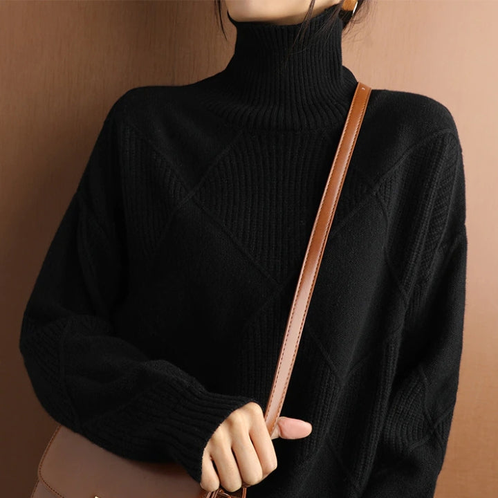 Elegant women's turtleneck knit sweater, a versatile pullover for chic autumn and winter fashion.