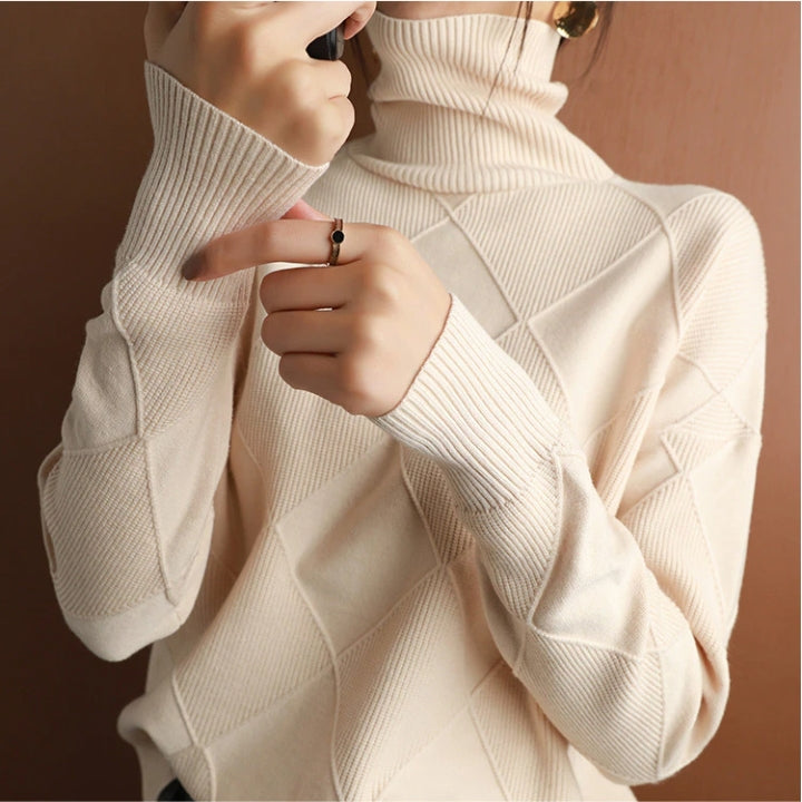 Textured knit women's cozy turtleneck sweater, a comfortable long sleeve pullover for cool weather.