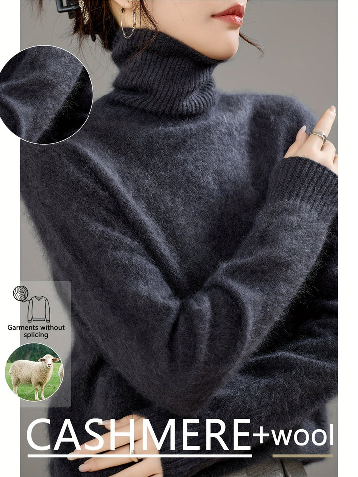 Warm women's oversized turtleneck sweater, essential cozy clothing for winter and chilly weather.