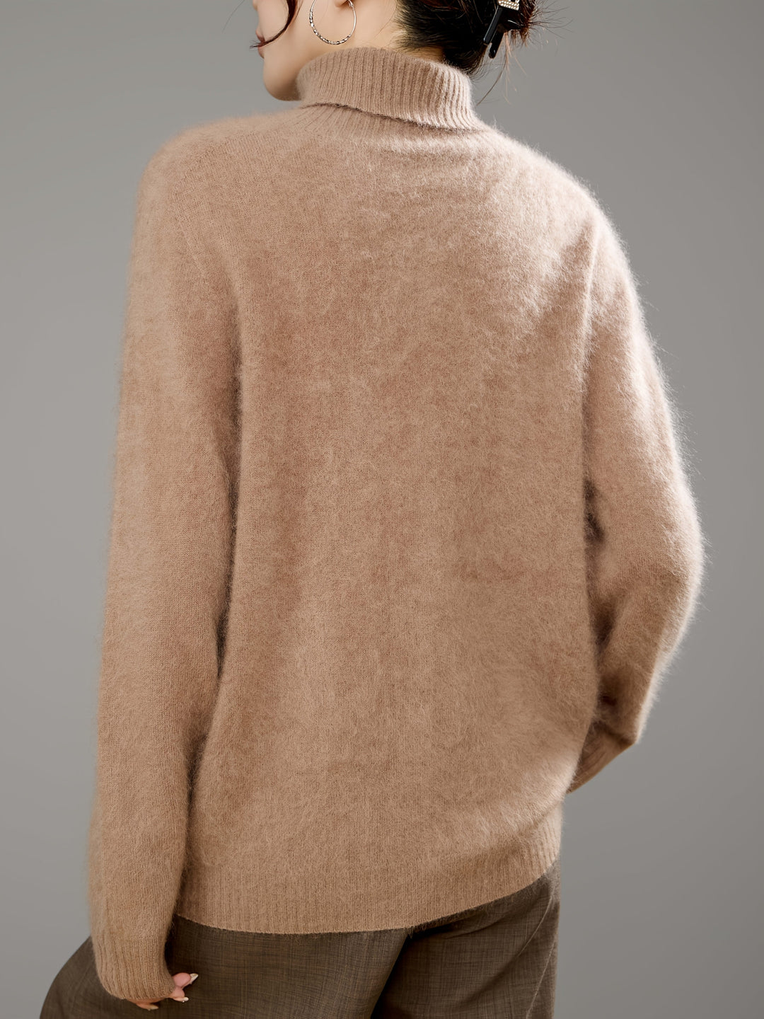 Women's warm and cozy turtleneck sweater, a comfortable choice for all your winter fashion needs.
