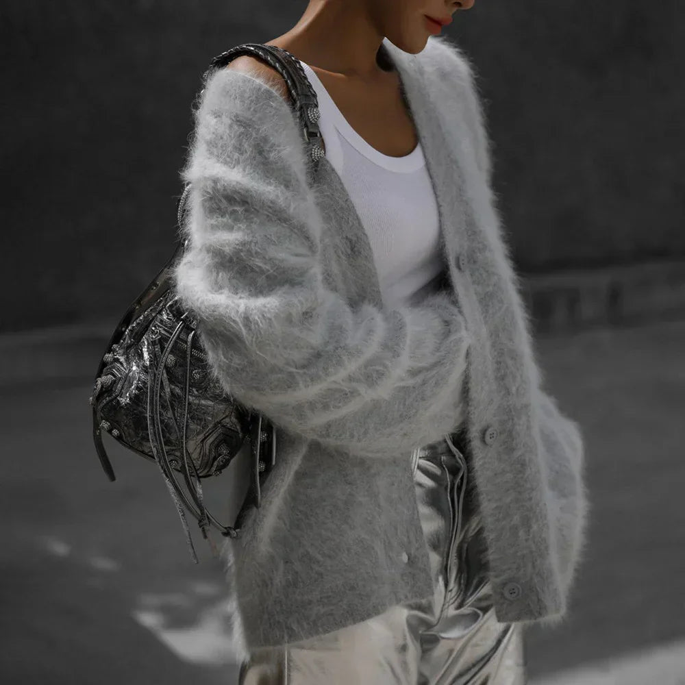 Soft knit v-neck cardigan for women, featuring a cozy relaxed fit & stylish button front. Great for layering.