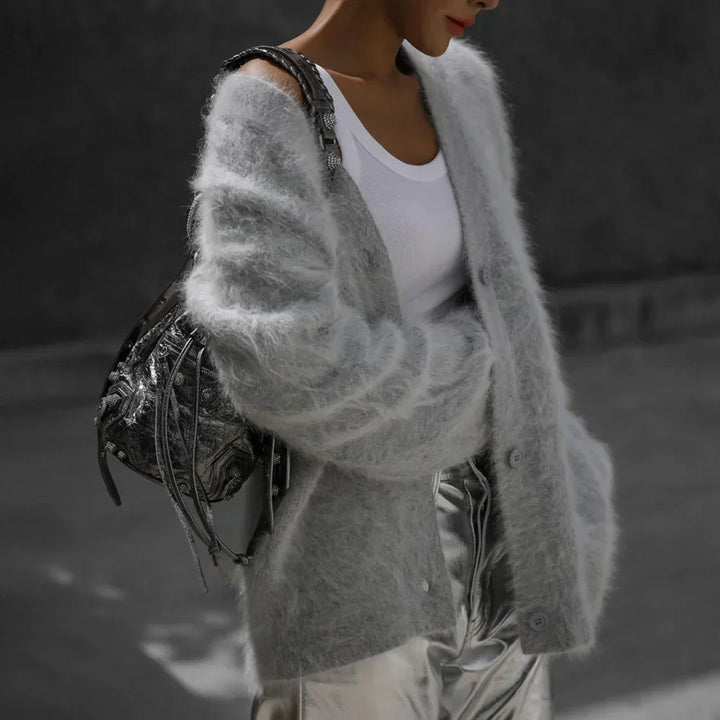 Soft knit v-neck cardigan for women, featuring a cozy relaxed fit & stylish button front. Great for layering.