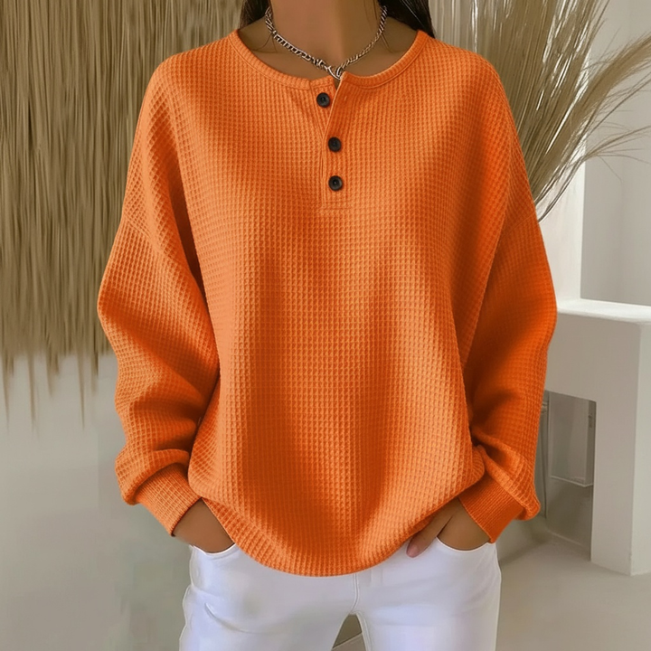 Women's cozy waffle knit pullover sweater in a relaxed fit, perfect for everyday comfort and casual wear.