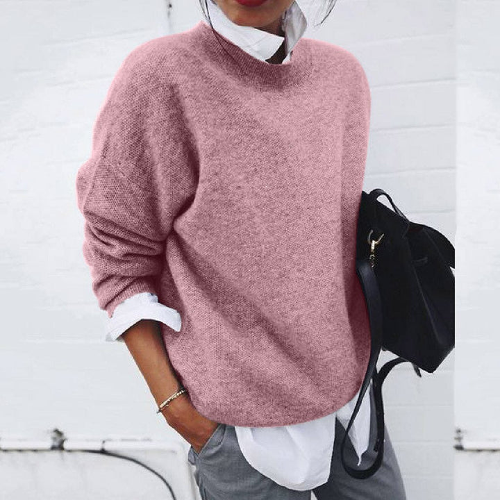 Long sleeve crew neck women's pullover sweater, a warm and stylish knit top for casual fashion.