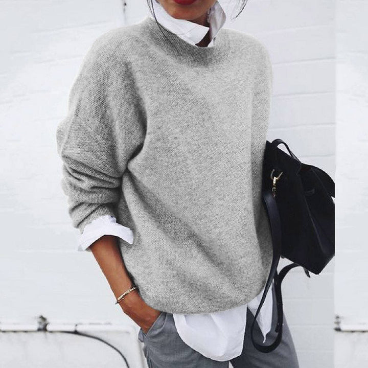 Cozy warm women's knit pullover sweater, perfect for comfortable everyday style and winter layering.