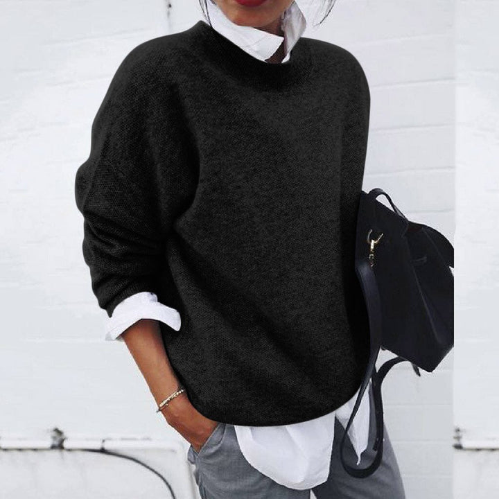 Stylish women's pullover sweater, soft knit, providing warmth and comfort for everyday casual wear.