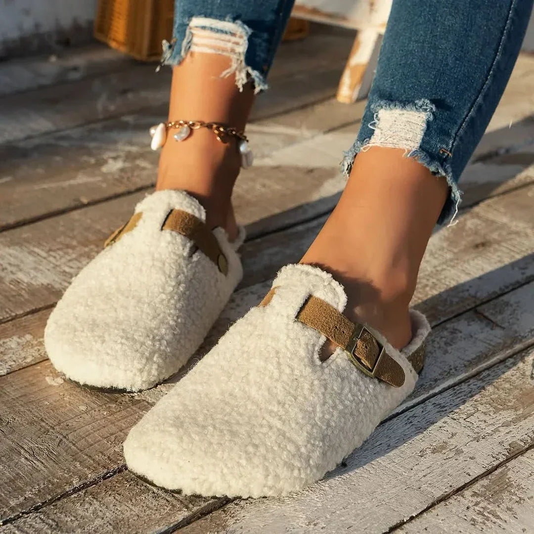 Cozy women's winter mules, warm and comfortable slip-on shoes for cold weather, perfect lounge footwear.
