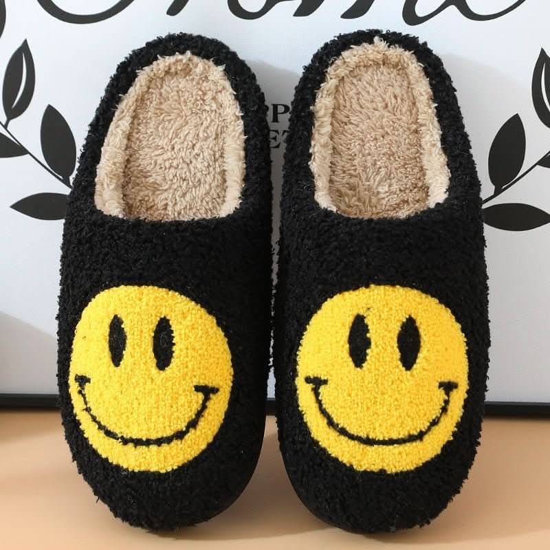 Essential winter women's slippers: cozy, soft, and warm with a smiley design and a thick non-slip sole.