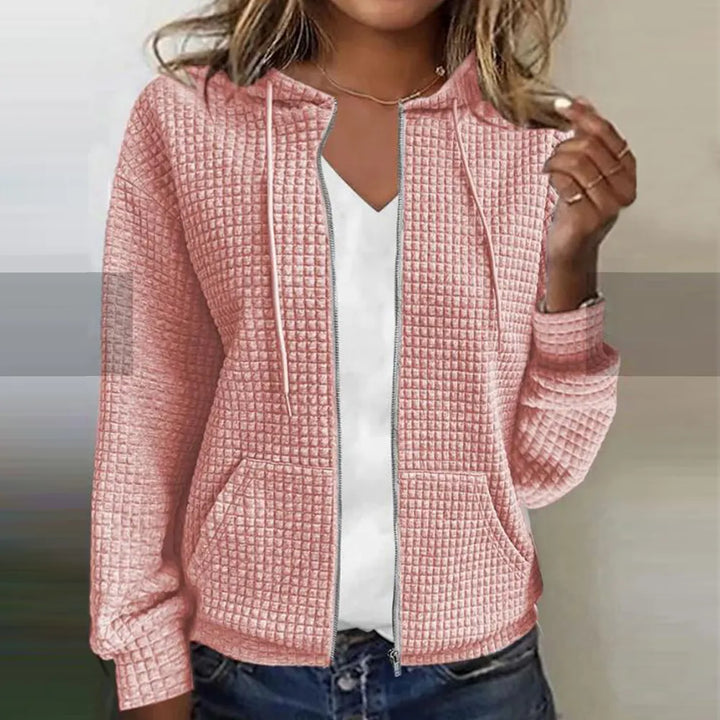 Women's cozy zip-front comfort jacket in a soft fabric, perfect for layering and casual style.