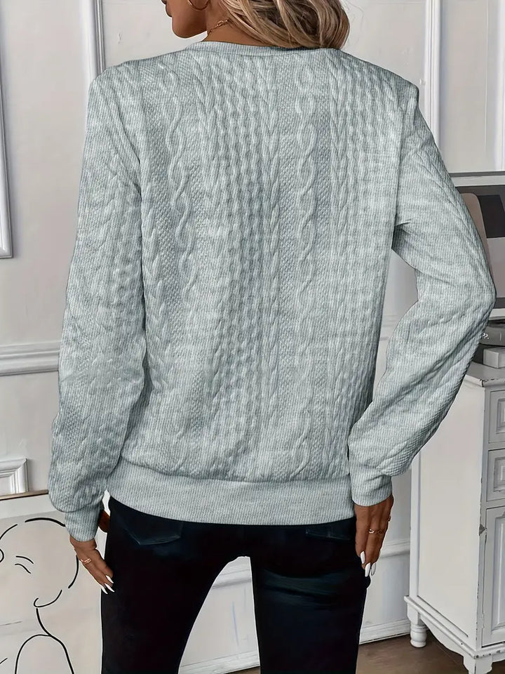 Relaxed fit women's zipper sweater, perfect for effortless style and cozy, comfortable wear all day.