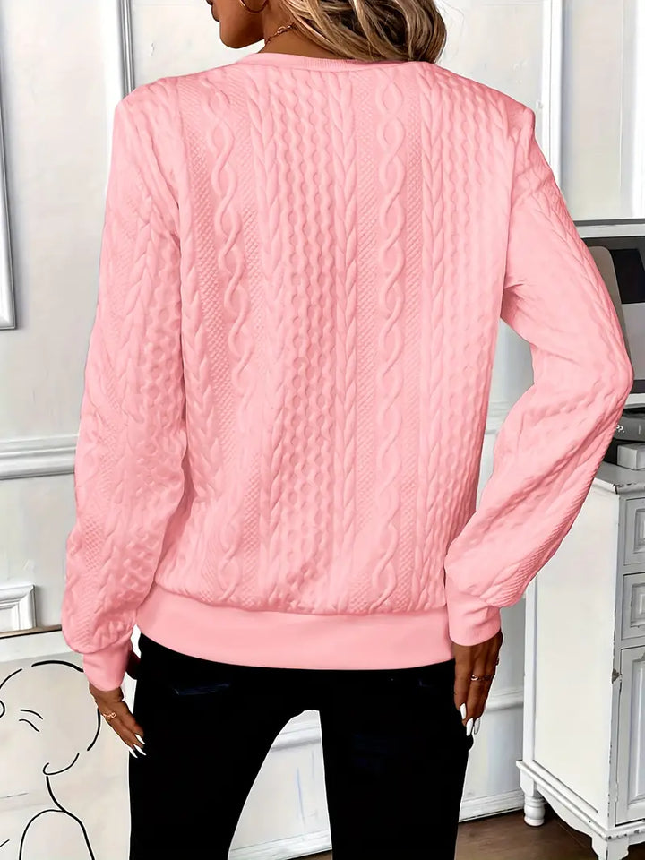 Effortless style meets comfort: Women's cozy knit sweater with a sleek zipper detail.
